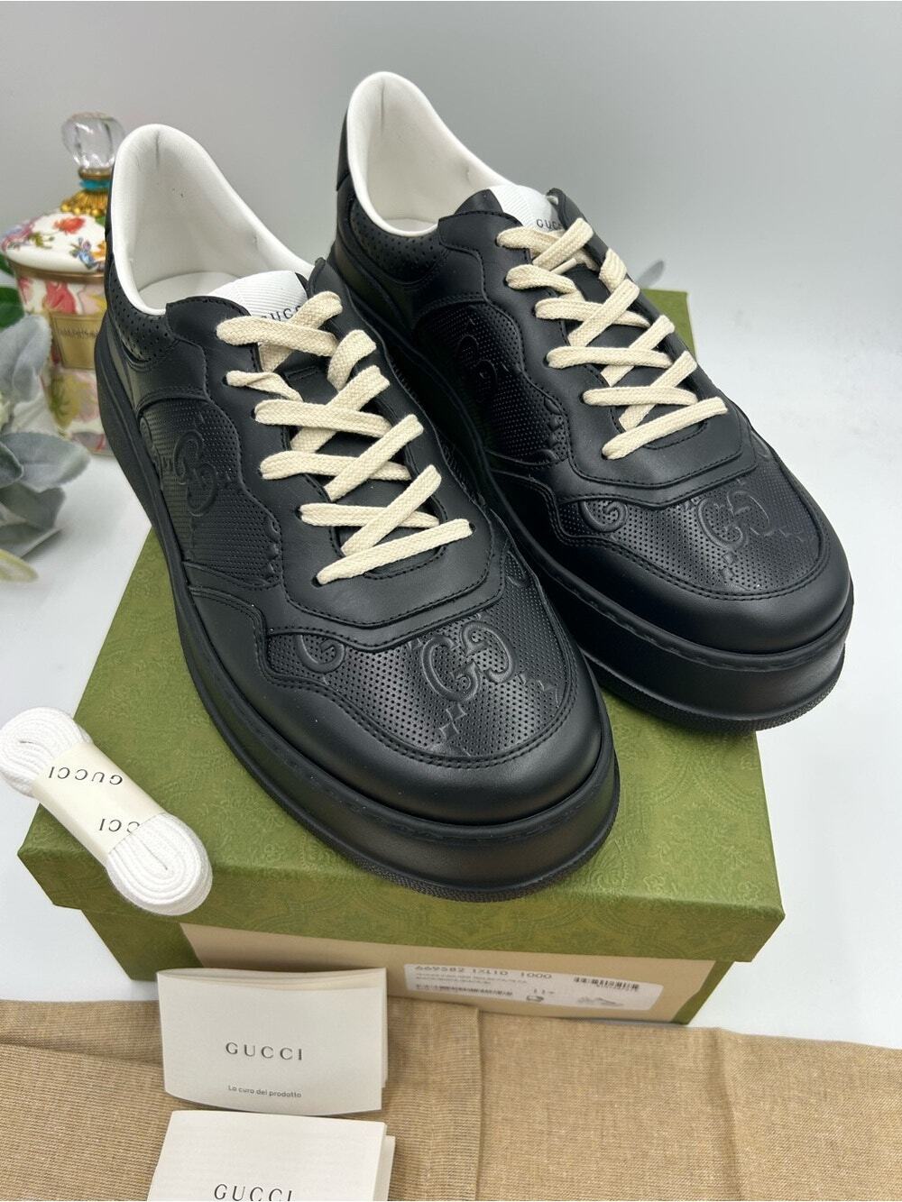 Men's Gucci, GG embossed leather sneakers size 11.5 fits 12 US made in Italy